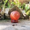Quả cầu đá phong thủy đá mắt mèo đỏ