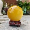 Quả cầu đá phong thủy đá mắt mèo vàng