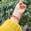 Vòng tay tóc đỏ mix charm vàng 18k