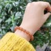 Vòng tay tóc đỏ mix charm vàng 18k