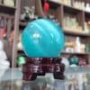 Quả cầu đá phong thủy đá mắt mèo màu xanh ngọc