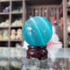Quả cầu đá phong thủy đá mắt mèo màu xanh ngọc
