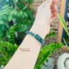 Vòng ngọc lam khánh khắc hoa mai