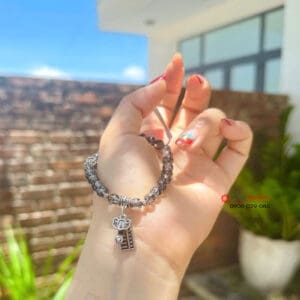 Vòng tay Tóc đen mix charm bạc